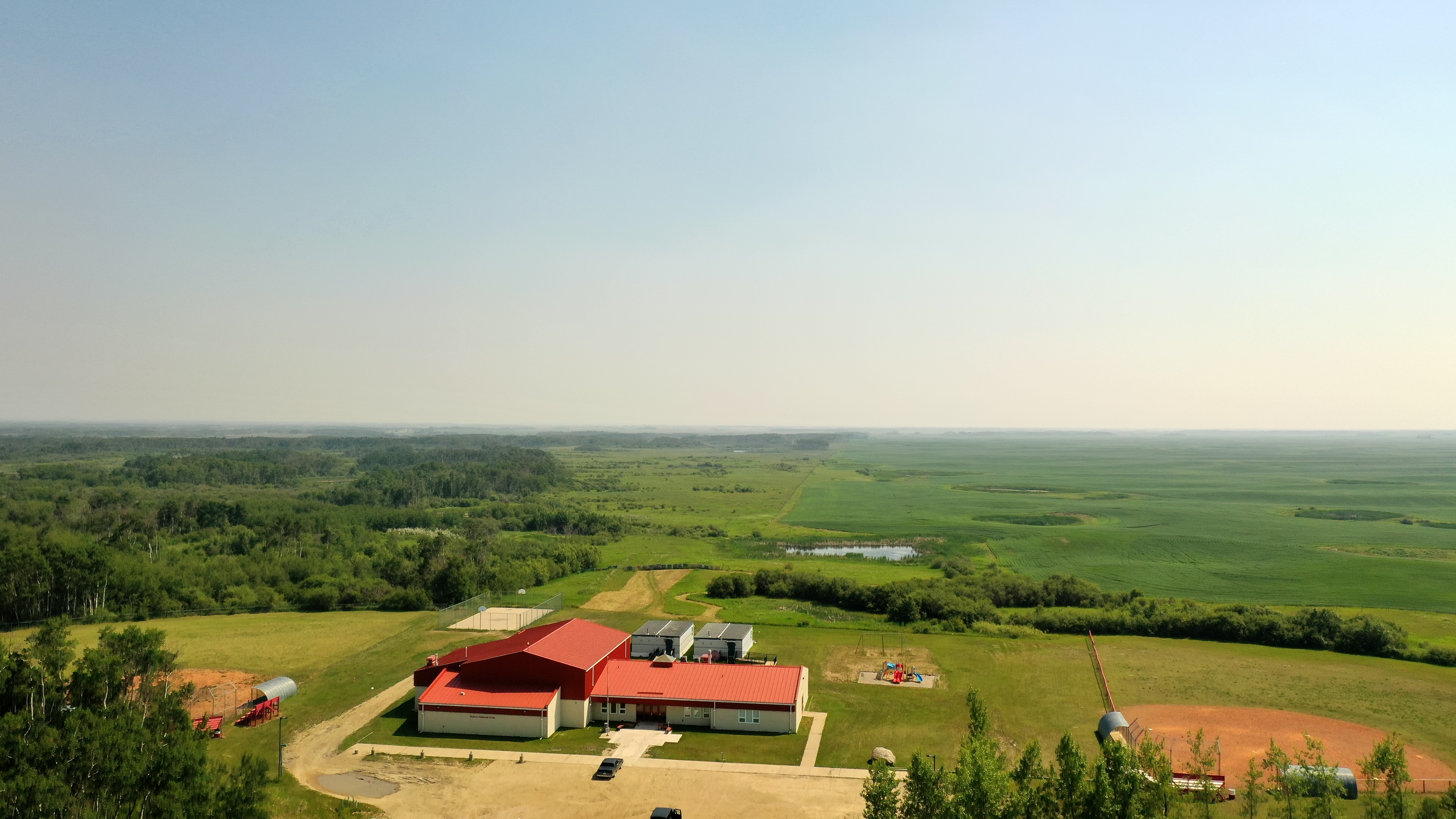 Okanese Learning Center building with red roof